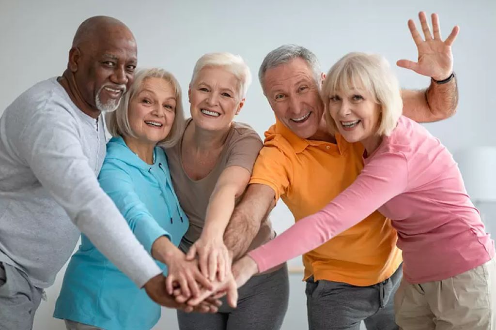 How can you encourage the elderly to participate in social activities?