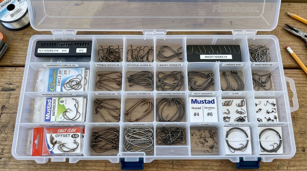 Organizing fishing hooks in a tackle box